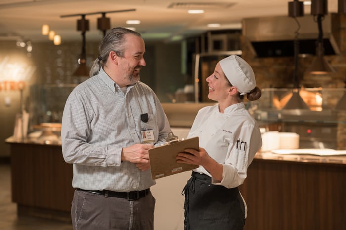 Two workers in dining area